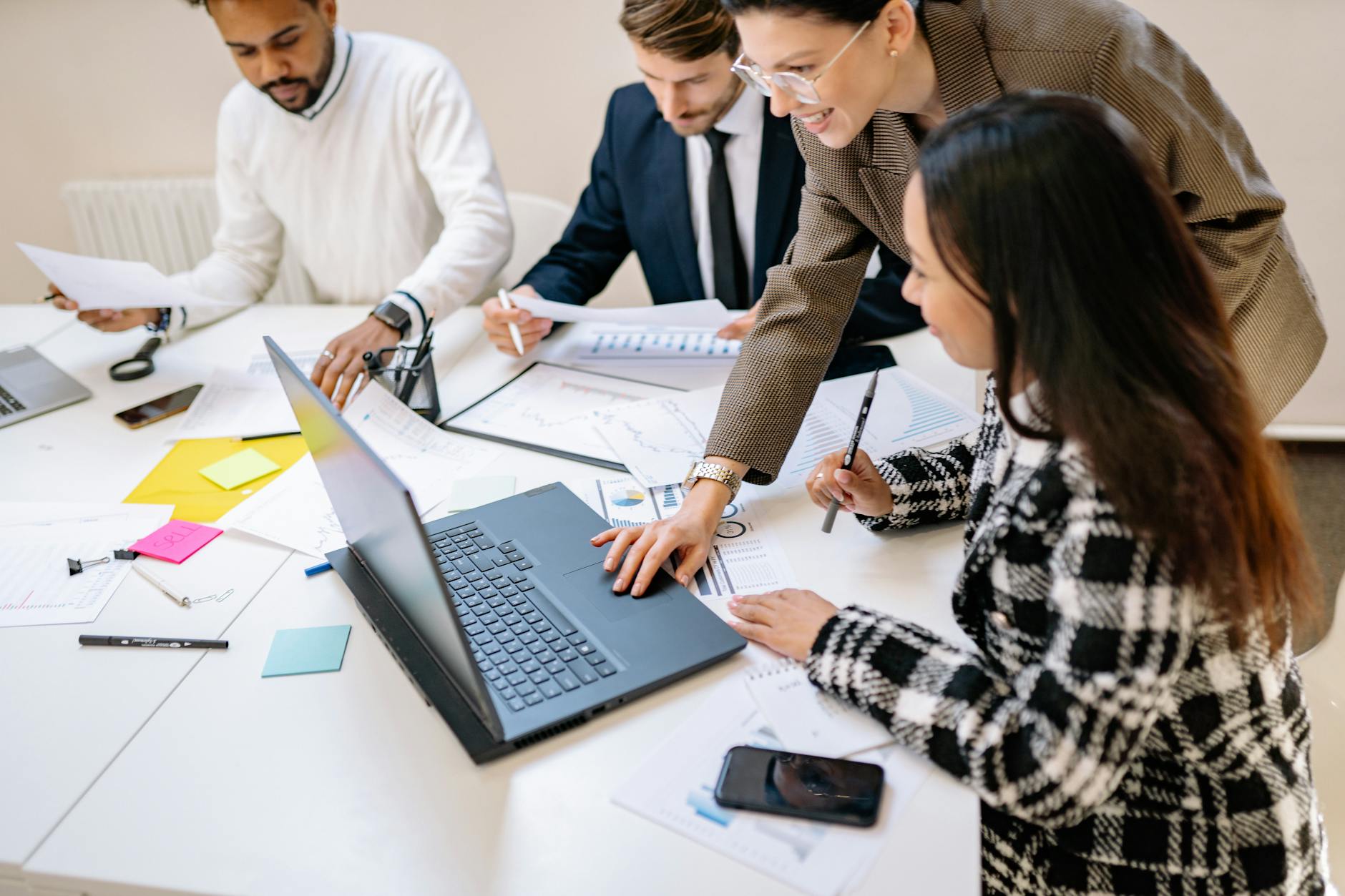 colleagues around table at work